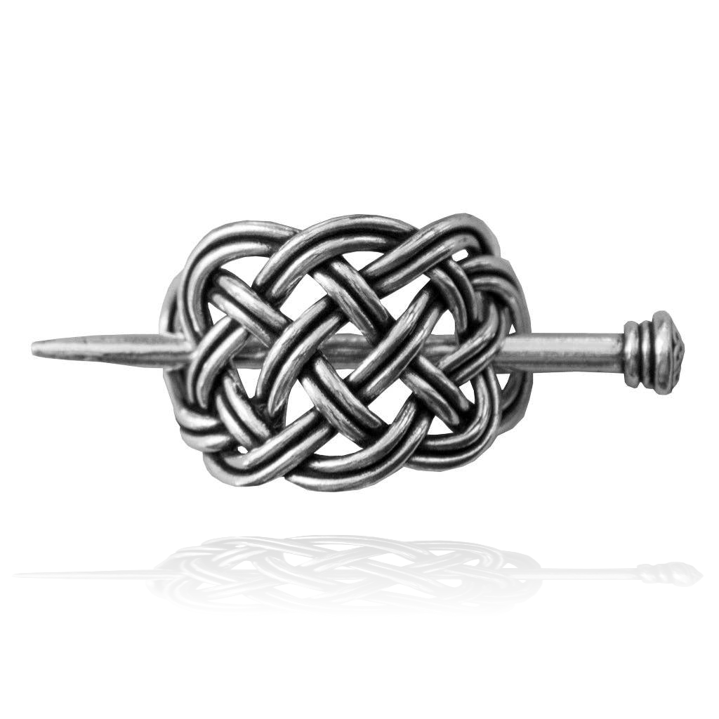 Silver Celtic knot hair stick with a pointed end and a ribbed cap, perfect for buns and updos.