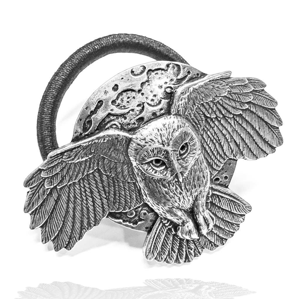 Silver night owl hair tie with outstretched wings and moon detail, handcrafted metal hair accessory